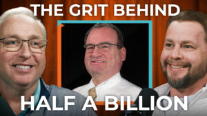 Three smiling men sit in a podcast studio under "The Grit Behind Half a Billion," discussing leadership and Any Hour Services insights.