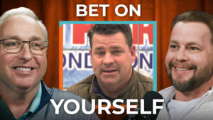 Three men smile and hold microphones. The overlaid text "BET ON YOURSELF" highlights their leadership and grit in conversation.