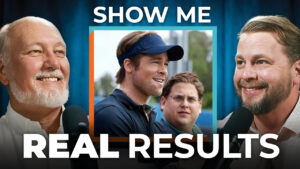Three men with microphones stand on either side of two actors’ photo; bold text reads "SHOW ME REAL RESULTS," promoting marketing performance.
