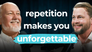 Two men smile and talk into microphones. Text on image reads: "brand repetition makes you unforgettable.
