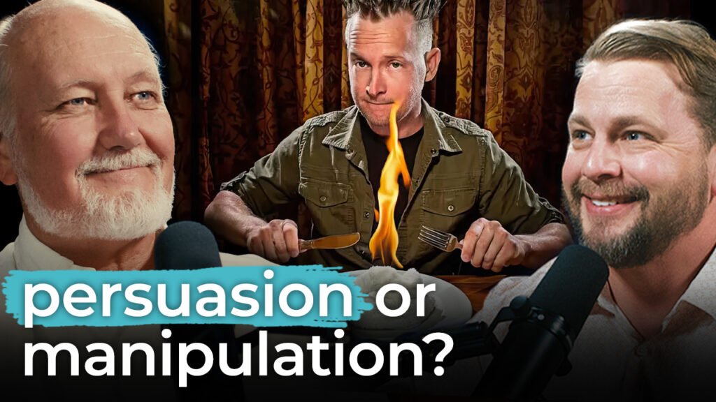 Three men sit at a table. The center man performs a magic trick, holding a flame on his tongue. Text: "persuasion or manipulation?.