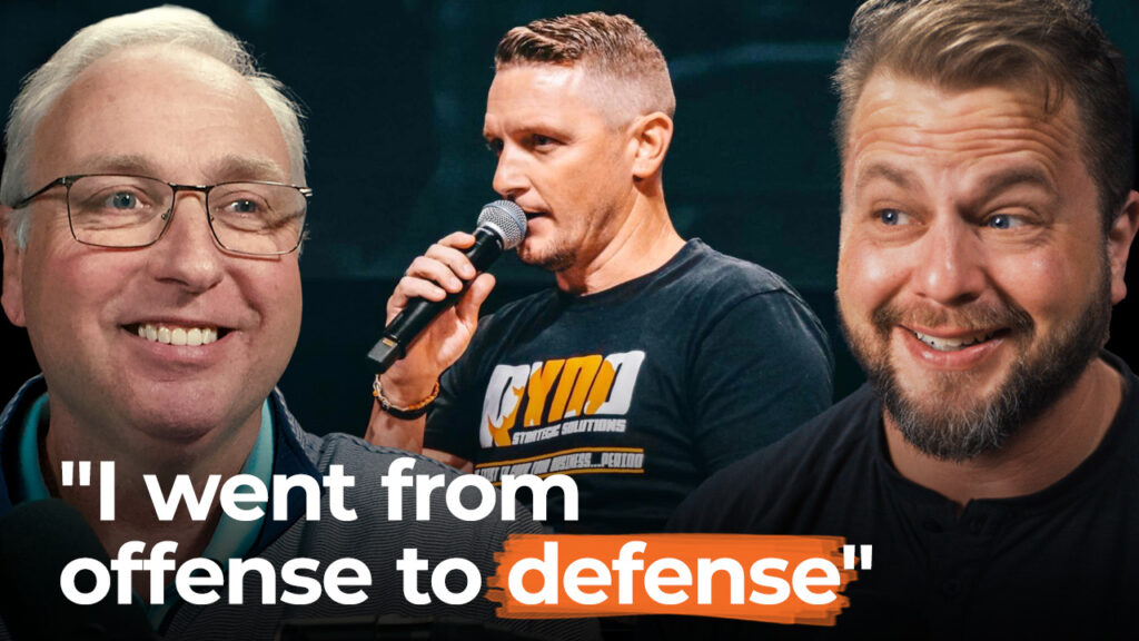 Three men smile as one speaks into a microphone; text says, "I move from offense to defense—selling my business brings new opportunities.